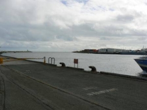 Fremantle harbour on a dull day, looking out to sea.