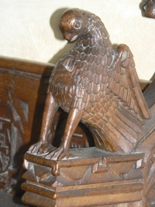 Arm rest carving. Bird - eagle?