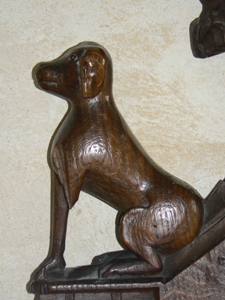 Arm rest carving. Another dog.
