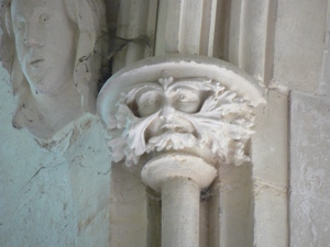 Carving of a Green Man in the south chancel window