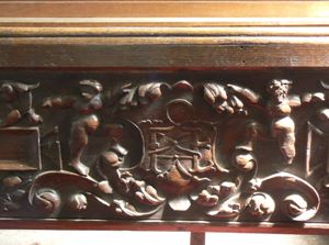 Close-up of central section of rear bench carving.