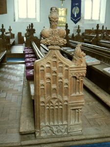 Bench end carving